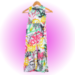 Stunning colourful African dress for preteen girls on a show hanger