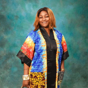 Norah wearing stunning colourful African dress